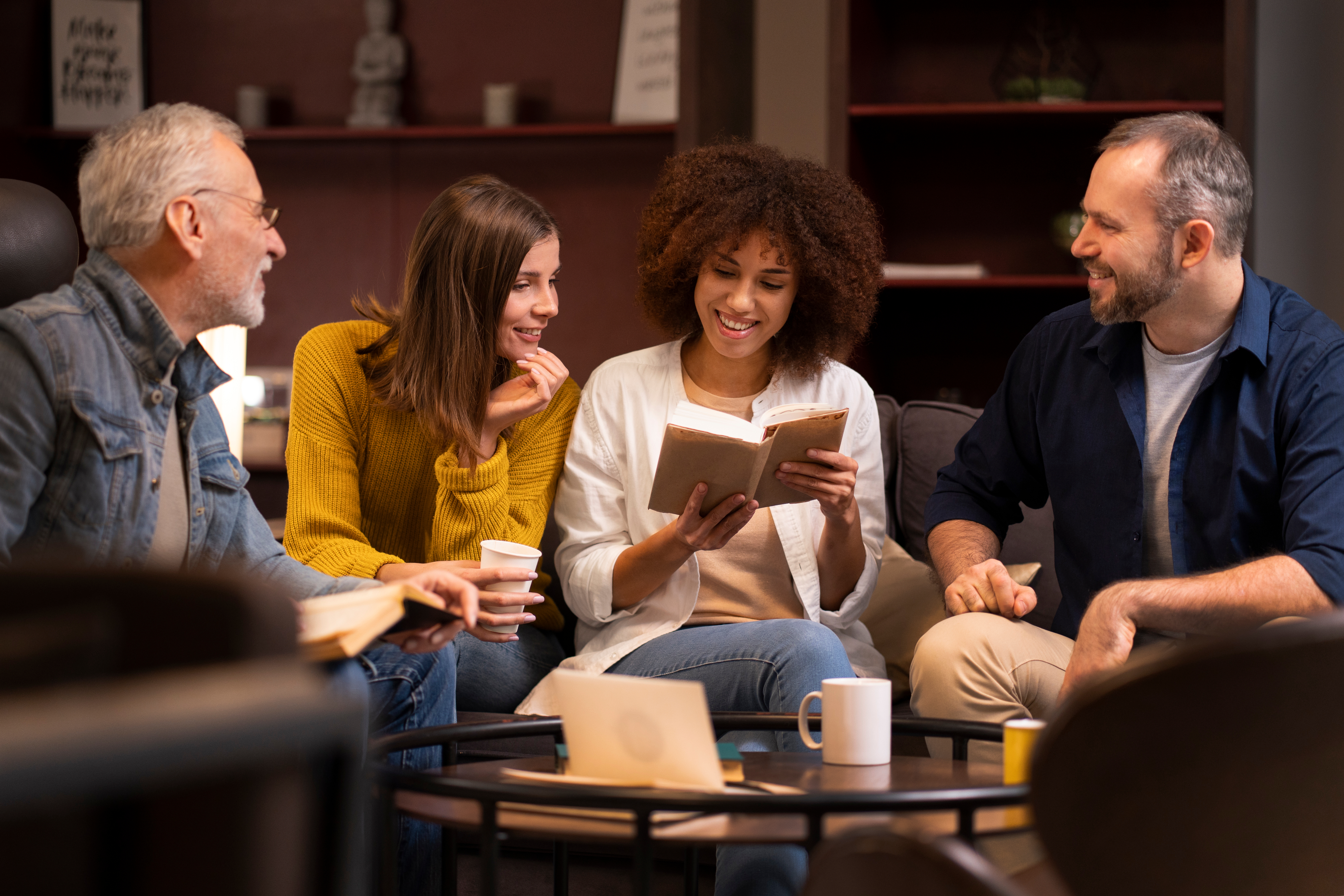 Friends gathered around a table — God's work